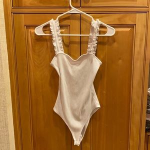 Ruffled body suit